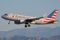 N3014R @ KLAX - AA A319 departing - by FerryPNL