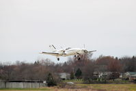 N345TP @ KIOW - Departing Runway 7 - by Glenn E. Chatfield