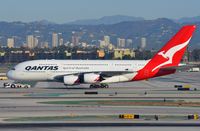 VH-OQG @ KLAX - Daily morning ritual for the Ozies, the move to the far away stand. - by FerryPNL