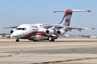 C-GVFT @ KBOI - Taxing on Alpha. Aircraft is a 1994 BAe Avro RJ85, c/n E2253. - by Gerald Howard