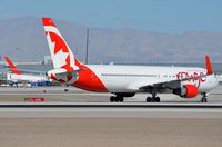 C-FIYA @ KLAS - Rouge B763 about to cross the runway. - by FerryPNL
