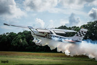 N8416M @ 23N - 1970 A150K with Smoke System flying at Bayport Aerodrome 23N
Owner and Pilot Michael De Mita.  Custom Paint by TN Wings - by Annmarie Bain