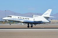 N957LJ @ KLAS - Falcon 50 about to touch-down. - by FerryPNL