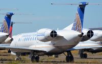 N15509 @ KIGM - Continental Express ERJ135 waiting for better times. - by FerryPNL