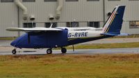 G-RVRE @ EGHH - Sat in the rain with its raincoat on - by John Coates