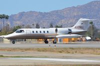 N354CL @ KVNY - Learjet 35A taking-off from VNY - by FerryPNL