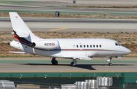 N230QS @ KLAX - Netjets DA2000 taxying inn. - by FerryPNL