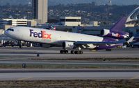 N593FE @ KLAX - Fedex MD11F lifting-off. - by FerryPNL