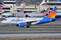 N324NV @ KLAX - Allegiant A319, formally operated by Easyjet as G-EZAE - by FerryPNL