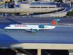 N97325 @ PHX - Taxying over the Skybridge - by Keith Sowter