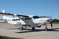 N107KA @ KBRL - Cessna 208B - by Mark Pasqualino