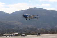 N8667H @ SZP - 1947 North American NAVION, Continental IO-520 285 Hp upgrade, takeoff climb Rwy 04, landing gear coming up - by Doug Robertson