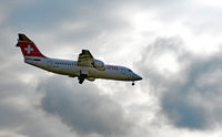 HB-IXO @ ZRH - Swiss International Airlines BAe 146-200 Avro RJ airplane before landing at Zurich International Airport. - by miro susta