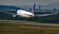 N670UA @ ZRH - United  Airlines Boeing 767-322 airplane landing at Zurich International Airport. - by miro susta