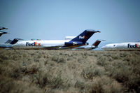 N284FE @ KMHV - In the parking lot, with many other FedEx planes at Mojave, CA - scanned from original slide taken Sept 1996 - by Neil Henry