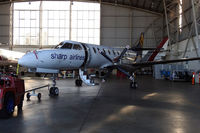 VH-UUB @ YMLT - In the Sharp Airlines hangar - by Micha Lueck