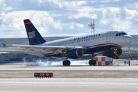 N764US @ KBOI - Touch down on RWY 28R. Still in old US Airways colors. - by Gerald Howard