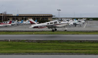 N2395V @ KSQL - Locally-based PA-28-181 Cherokee landing @ San Carlos Airport, CA - by Steve Nation