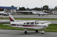 N2395V @ KSQL - Locally-based PA-28-181 Cherokee taxiing @ San Carlos Airport, CA - by Steve Nation