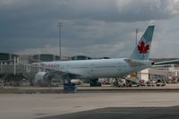 C-FIVR @ LFPG - Boeing 777-333ER, Boarding gate Roissy 2, Roissy Charles De Gaulle airport (LFPG-CDG) - by Yves-Q