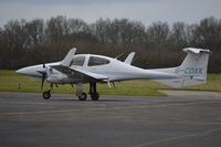 G-CDXK @ EGTB - Diamond DA-42 Twin Star at Wycombe Air Park. - by moxy