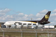 N422UP @ KRSW - UPS Cargo sits on the cargo ramp at Southwest Florida International Airport - by Donten Photography