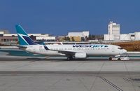 C-FWSE @ KLAX - WestJet Boeing 737-8CT, taxiway Sierra KLAX - by Mark Kalfas