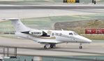 N100NV @ KLAX - Taxiing to parking at LAX - by Todd Royer