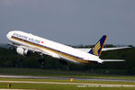 9V-SNB @ EGCC - Singapore Airlines - by Chris Hall