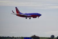 N705SW @ KOAK - Landing 28R at North Field Oakland Airport. - by Clayton Eddy