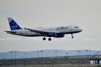 N665JB @ KOAK - Landing runway 28L at North Oakland Airport. - by Clayton Eddy