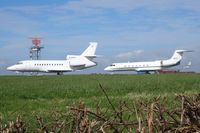 D-AHER @ EGFF - Falcon 900EX, and Gulfstream GV-SP, seen parked up. - by Derek Flewin