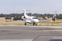 N227SL @ YSWG - Embraer Phenom 300 (N227SL) taxiing at Wagga Wagga Airport - by YSWG-photography