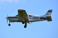 G-CBZR @ EGHP - Piper PA-28R-201 Cherokee Arrow landing at Popham. Ex N175ND - by moxy