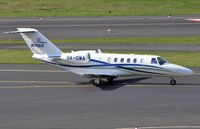 9A-DWA @ EDDL - Cessna 525A taxying for departure - by FerryPNL