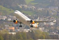 G-TCDM @ LOWI - Taking off from LOWI, with Innsbruck in the background - by Paul H