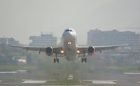 G-TCDC @ LOWI - Rocketing out of LOWI, Innsbruck with the austrian alps in the background - by Paul H