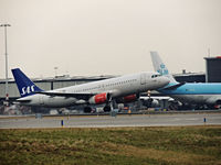 OY-KAM @ EHAM - sas departing runway 24 - by fink123