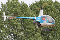 G-BSGF @ EGBR - Robinson R22 Beta at Breighton Airfield's Summer Madness Fly-In. August 5th 2012. - by Malcolm Clarke