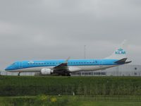 PH-EZE @ EHAM - KLM EMBREAR TAXING TO RUNWAY 36C - by fink123
