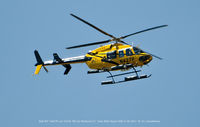 N427P @ BWI - Bell407 over BWI Airport. - by J.G. Handelman