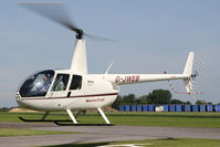 G-JWEB @ EGBR - Robinson R44 Raven at Breighton Airfield's Open Cockpit and Biplane Fly-In. June 1st 2014. - by Malcolm Clarke