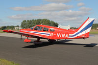 G-NINA @ EGBR - Piper PA-28-161 Cherokee Warrior II at Breighton Airfield's Helicopter Fly-In. September 22nd 2013. - by Malcolm Clarke