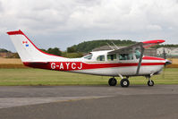 G-AYCJ @ EGBR - Cessna TP206D Super Skylane at Breighton Airfield's Summer Madness Fly-In. August 5th 2012. - by Malcolm Clarke