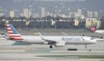 N125AA @ KLAX - Taxiing to gate at LAX - by Todd Royer