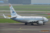 YR-BGG @ EHAM - YR-BGG Boeing 737/700 of Tarom special 60th Anniversary scheme at Amsterdam Schiphol Airport. - by Robbo s