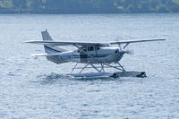 N206MX - Braking hard with open doors. Seaplane fly-in Morcote - by sparrow9