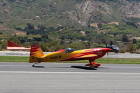 N669AJ @ SZP - Extrafleugzeugproduktions EA330/SC, Lycoming IO-360-L1B5 300 Hp modified to 330 Hp? ex-Breitling racer, landing roll Rwy 22 - by Doug Robertson