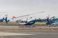 N1085T @ OXR - 1980 Bell 206L-1 LongRanger II, one Allison 250-C28B TurboShaft 500 shp, LongRanger II introduced in 1978-this is a II, on Aspen Helicopters ramp - by Doug Robertson