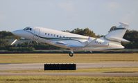 N100JS @ ORL - Falcon 2000EX - by Florida Metal